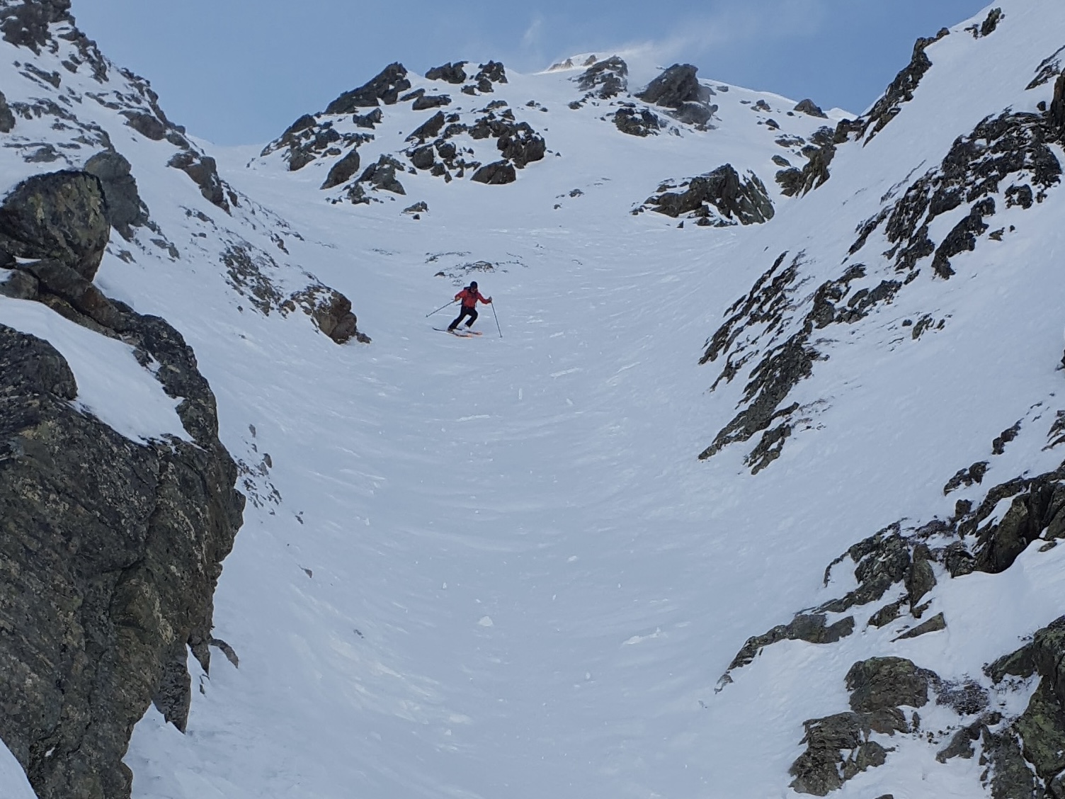 Skiing Steep Couloir